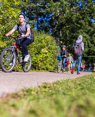 Bicyclists on campus bike path