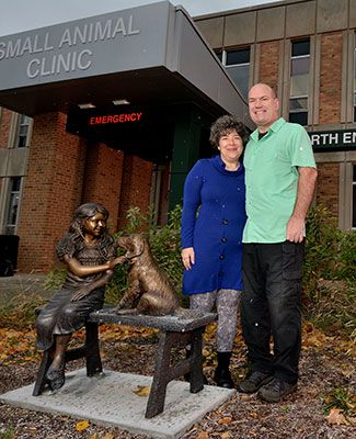 carol prahinski and flemming mathiasen pose in their garden outside the small animal clinic