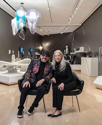 alan and rebecca ross, seated in a gallery at the MSU Broad Art Museum