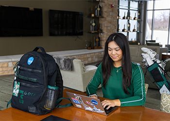 Student-athlete Katie Lu studying on campus.