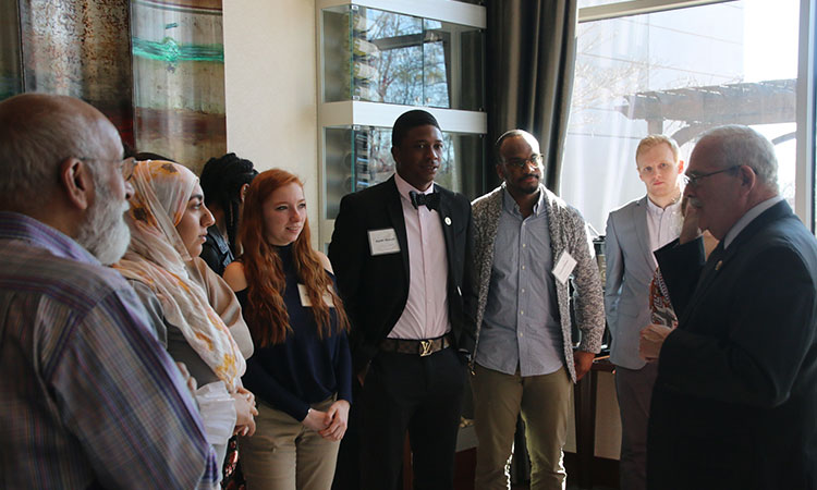 Students speak with congressman.