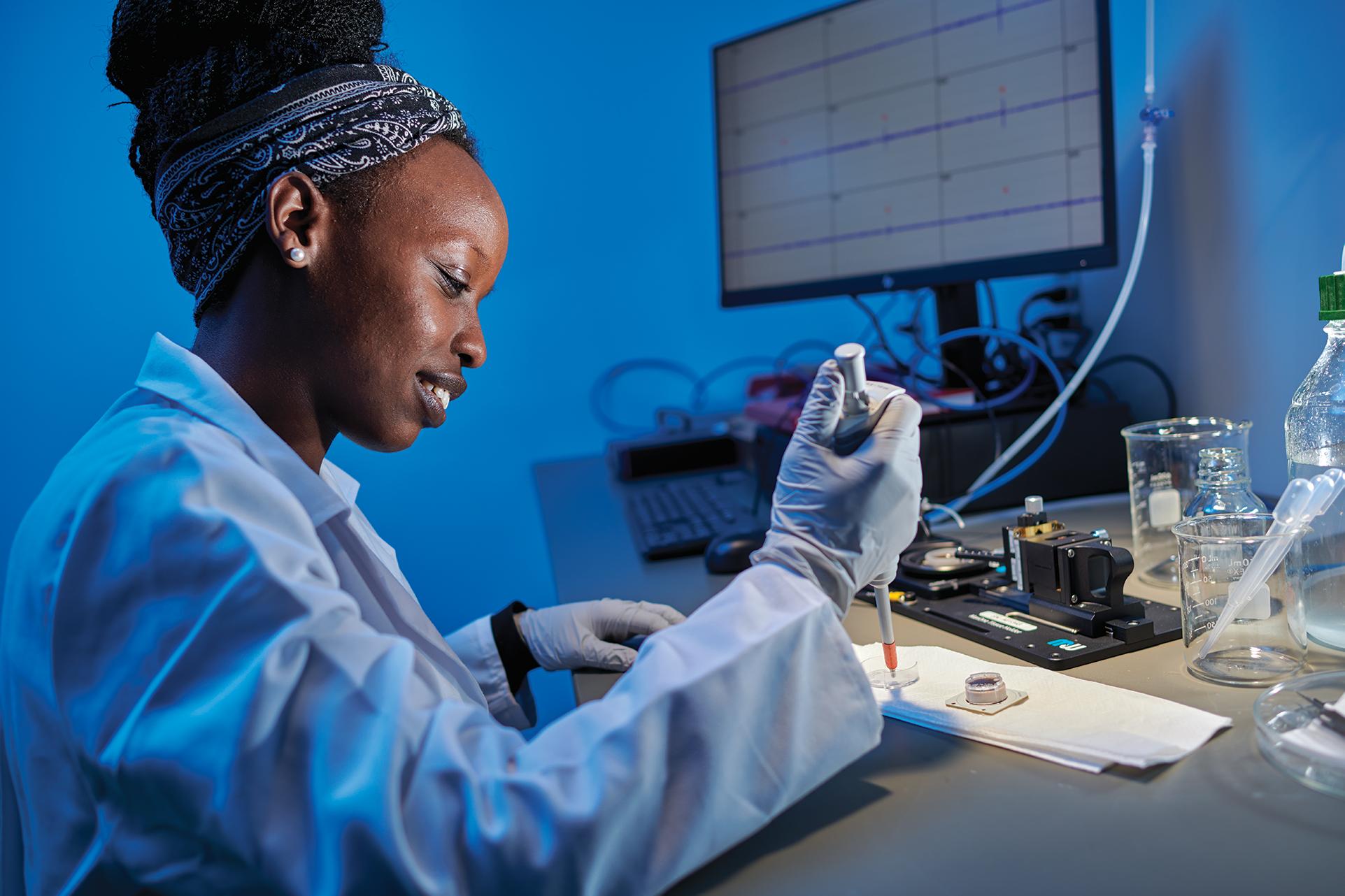 scientist prepares microelectrode array