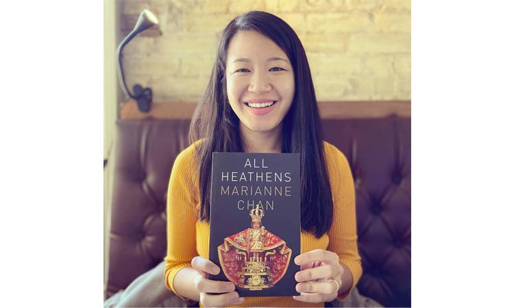 Marianne Chan holding "All Heathens"