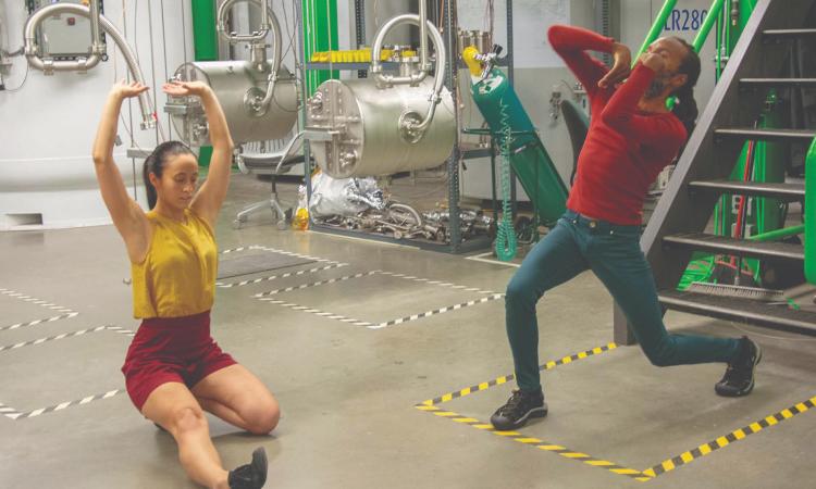 Two members of the Maryland-based Dance Exchange perform an excerpt from the dance performance “Of Equal Place: Isotopes in Motion.”