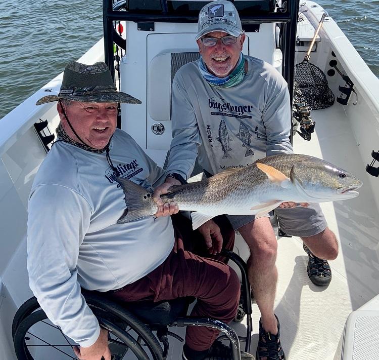 Mark Andrews and Robbie Red fishing